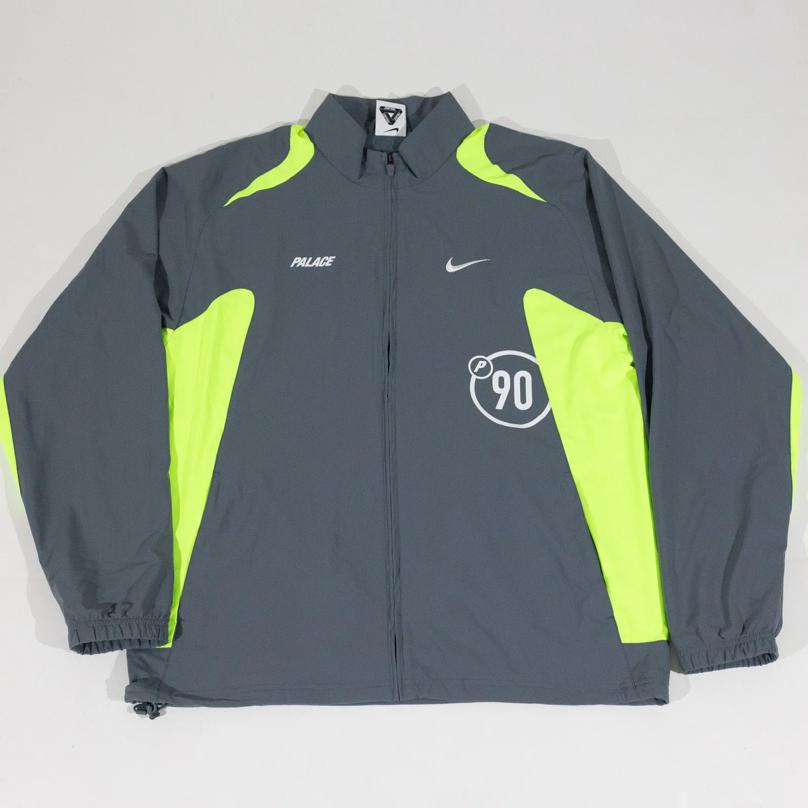 Jaqueta Palace Skateboards x Nike - Total 90 ‘P90’ cinza