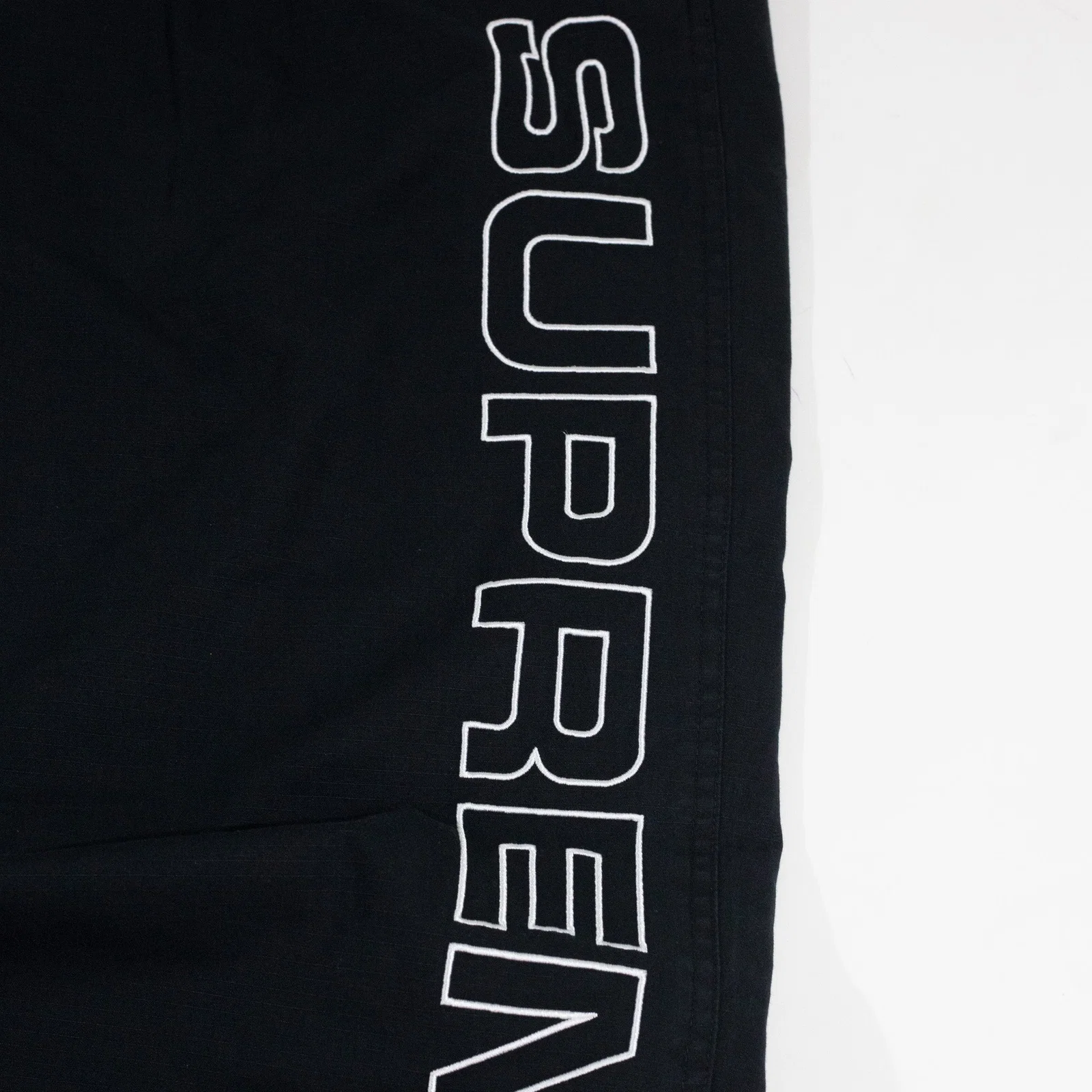 Calça Supreme Spellout Embroidered — foto 6