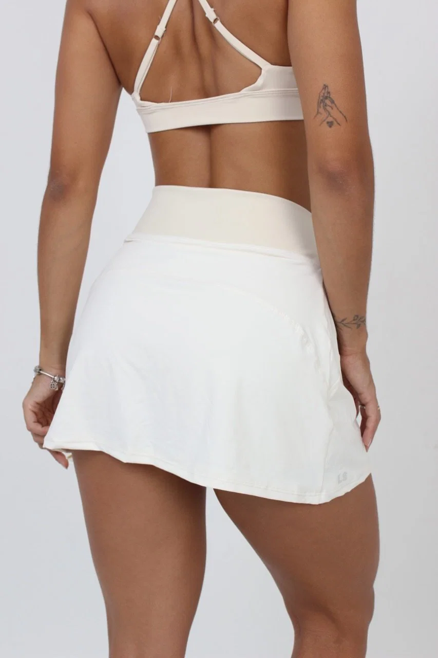 Short saia com sobreposição, tecido Dynamic Supreme e short embutido. — foto 6